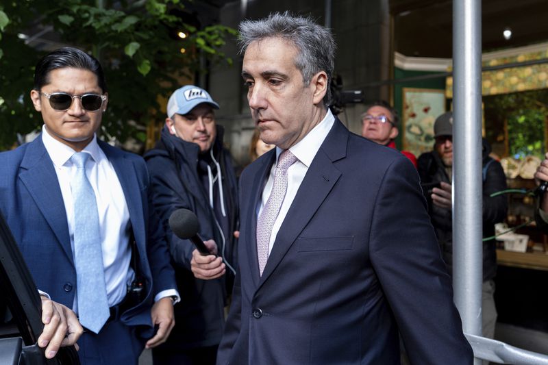 FILE - Michael Cohen leaves his apartment building on his way to Manhattan criminal court, May 13, 2024, in New York. The testimony in Donald Trump's hush money trial is all wrapped up after more than four weeks and nearly two dozen witnesses, meaning the case heads into the pivotal final stretch of closing arguments, jury deliberations and possibly a verdict. Expect the defense to attack the credibility of Cohen, who pleaded guilty to federal charges related to the payment and who was accused by Trump's lawyers of lying even while on the witness stand. (AP Photo/Julia Nikhinson, File)