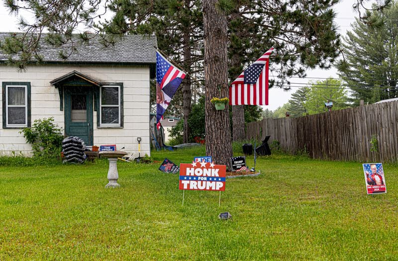 Signs in support of Republican presidential nominee Donald Trump at a home in Woodruff, Wis., on Thursday, June 6, 2024. (Photo by Donovan Johnson/News21)