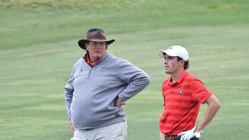 Georgia' golf coach Chris Haack (left), talking to senior Will Kahlstorf in a tournament earlier this season, has agreed to a five-year contract extension to remain the Bulldogs' director of golf.