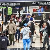 Travelers streamed into Hartsfield-Jackson International Airport on Friday, August 30, 2024, which was expected to be the busiest day of the Labor Day travel period. (John Spink / John.Spink@ajc.com)