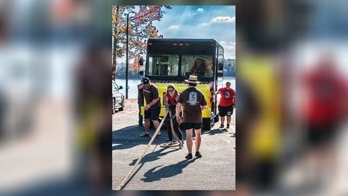 After receiving a lung cancer diagnosis, Christy Erickson of Macon resolved to live out her fantasy of pulling a UPS truck in a Strongman competition. (Photo provided by Christy Erickson)