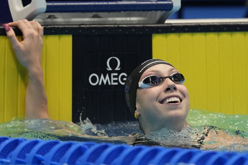 Gretchen Walsh smiles after a Women's 50 freestyle semifinals heat Saturday, June 22, 2024, at the US Swimming Olympic Trials in Indianapolis. (AP Photo/Michael Conroy)