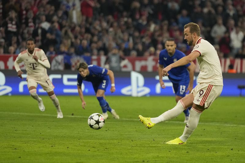 Bayern's Harry Kane scores the opening goal from the penalty sport during the Champions League opening phase soccer match between Bayern Munich and GNK Dinamo at the Allianz Arena in Munich, Germany Tuesday, Sept. 17, 2024. (AP Photo/Matthias Schrader)