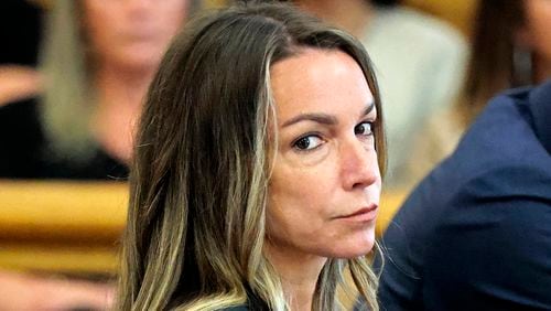 FILE - Karen Read looks toward the jurors, as they are greeted by Judge Beverly J. Cannone during her trial at Norfolk Superior Court in Dedham, Mass., Monday, July 1, 2024. (Pat Greenhouse/The Boston Globe via AP, Pool, file)