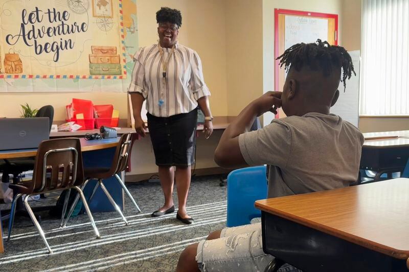 Mannika Hopkins laughs with one of her fourth grade students at Greenville Elementary School in Greenville, Fla. on Aug. 14, 2024. (AP Photo/Kate Payne)