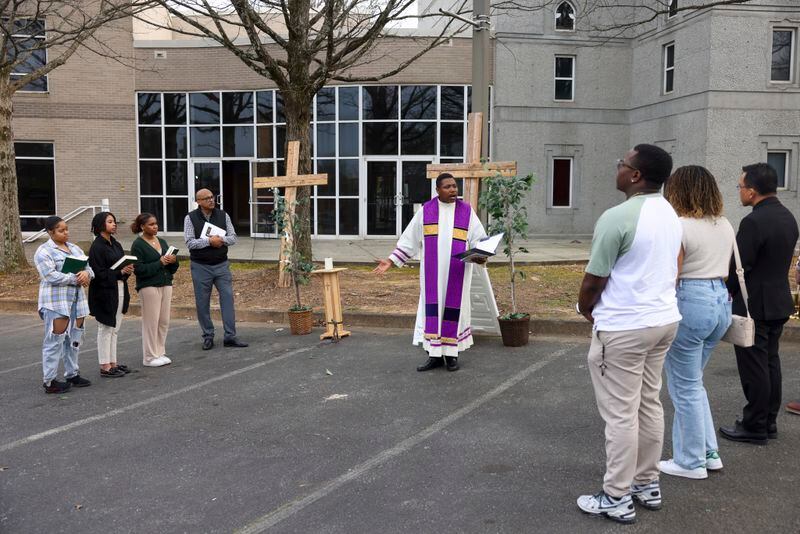 Father Urey Patrick Mark leads a prayer vigil for Jatonne Sterling at the parking lot of the Lyke House, the Catholic center and ministry at Atlanta University Center, on Wednesday, March 1, 2023, in Atlanta. Jatonne Sterling, a Clark Atlanta student, was fatally shot in the center’s parking lot, on Beckwith Street the day before, Tuesday afternoon, Feb. 28, 2023. Jason Getz / Jason.Getz@ajc.com)
