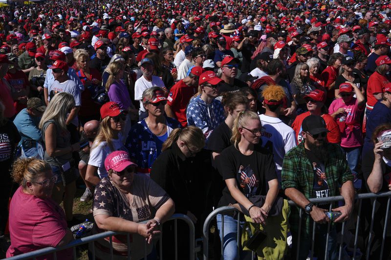 Supporters arrive before Republican presidential nominee former President Donald Trump speaks at a campaign rally at the Butler Farm Show, Saturday, Oct. 5, 2024, in Butler, Pa. (AP Photo/Julia Demaree Nikhinson)