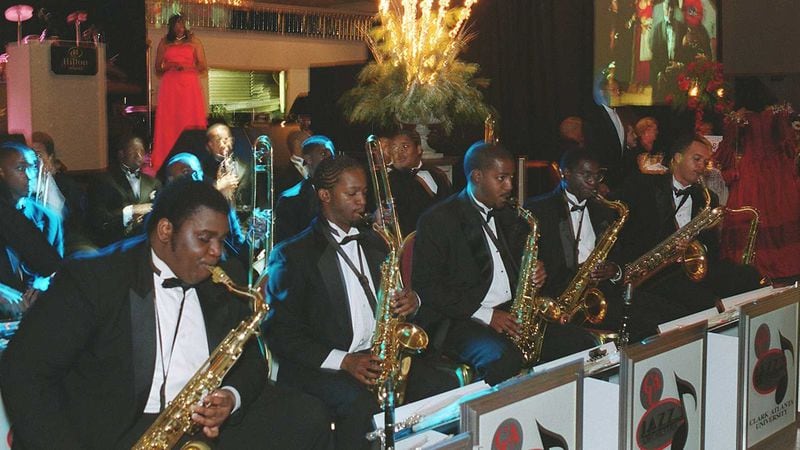 Members of the Clark Atlanta University Jazz Orchestra perform at the Mayor’s Masked Ball at the Atlanta Hilton in 2001. The ball is a fundraiser for Clark Atlanta and other historically Black colleges and universities in Atlanta. (Greg Knobloch/Special)