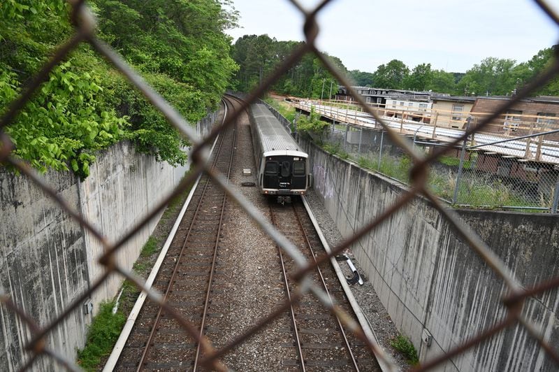 A MARTA train passes under Joseph E. Boone Boulevard NW on Wednesday, April 24, 2024. Atlanta Mayor Andre Dickens announced Monday the largest expansion to MARTA’s train network in decades with four new stations expected to join the public transit system, including one at a large development project along the Beltline. One of four new infill MARTA stations will be Joseph E. Boone Boulevard between Ashby and Bankhead. (Hyosub Shin / AJC)