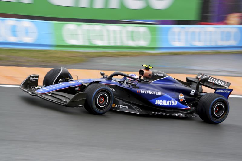 Williams driver Logan Sargeant of the US steers his car during the first practice session ahead of the Formula One Dutch Grand Prix auto race, at the Zandvoort racetrack, Netherlands, Friday, Aug. 23, 2024. (AP Photo/Peter Dejong)