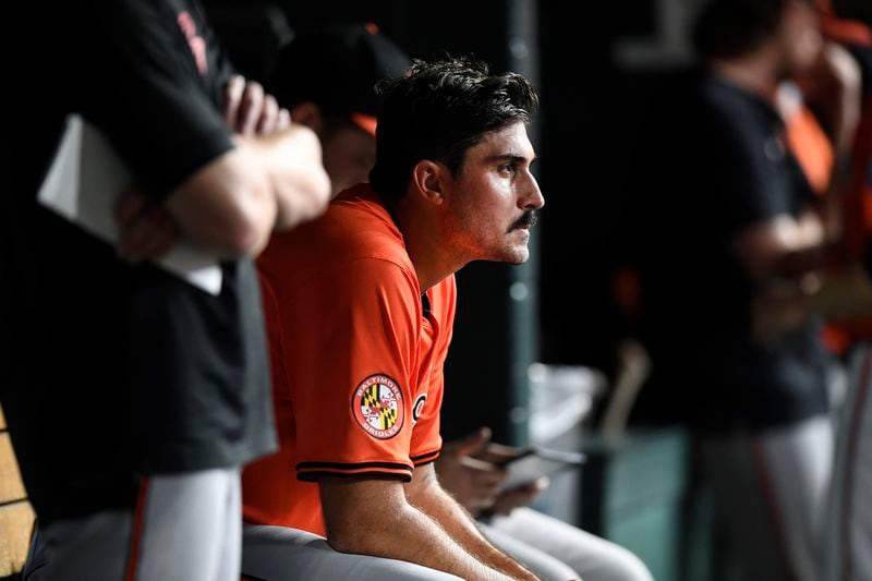 Baltimore Orioles starting pitcher Zach Eflin watches from the dugout after being taken out in the seventh inning of a baseball game against the Detroit Tigers, Friday, Sept. 13, 2024, in Detroit. (AP Photo/Jose Juarez)