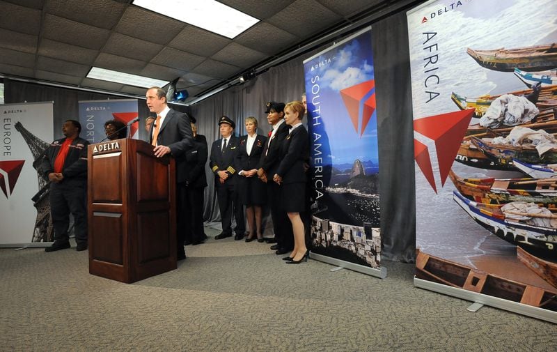 081112 Atlanta, GA: Delta Air Lines today announced it is adding 15 new international routes for summer 2009. Glen Hauenstein, executive vice president of Network Planning and Revenue Management, speaks during the press conference at Delta Air Lines World Headquarters. Delta and Northwest employees stand behind. Wendesday, November 12, 2008 HYOSUB SHIN / hshin@ajc.com