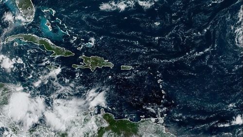 A satellite image captured on Sept. 30, 2024 shows a new disturbance in the Caribbean Sea that the National Hurricane Center says could develop into a tropical storm in the next week or beyond.