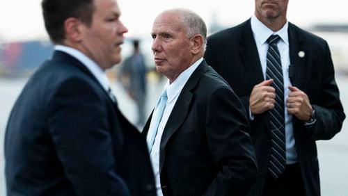 Steven H. Sadow, center, arrives at the airport in Atlanta on Aug. 24, 2023, after Donald J. Trump’s booking at the Fulton County Jail. Steven Sadow has represented Atlanta’s top rap stars, one of its most famous strip club owners and a friend of NFL legend Ray Lewis charged with the linebacker in a double homicide outside a Buckhead nightclub. (Doug Mills/The New York Times)