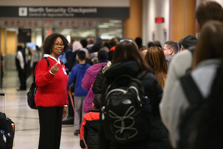 PHOTOS: Atlanta airport travelers stuck in long TSA wait lines