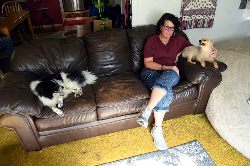 Becky Blackburn, one of the few Democrats in Niobrara County, poses for a portrait in her home, July 30, 2024, in Lusk, Wyo. (AP Photo/Thomas Peipert)