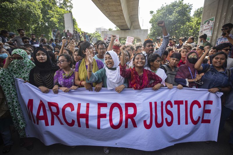 FILE- University students shout slogans during a protest to demand justice for the victims killed in the recent countrywide deadly clashes and ask for their campuses to be opened, in Dhaka, Bangladesh, July 31, 2024. (AP Photo/Rajib Dhar, File)