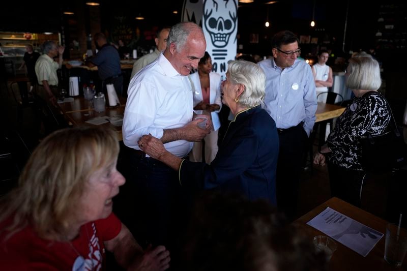 Sen. Bob Casey, D-Pa., greets a supporter after speaking at a campaign event, Monday, July 1, 2024, in Scranton, Pa. (AP Photo/Matt Slocum)