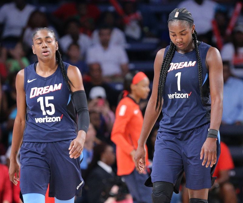 August 26, 2018 Atlanta: Atlanta Dream guard Tiffany Hayes (left) and center Elizabeth Williams fall 87-84 to the Washington Mystics in a WNBA semifinal playoff game on Sunday, August 26, 2018, in Atlanta.   Curtis Compton/ccompton@ajc.com