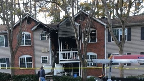 A fire destroyed the roof of an 18-unit condo complex in Roswell, displacing a dozen families.