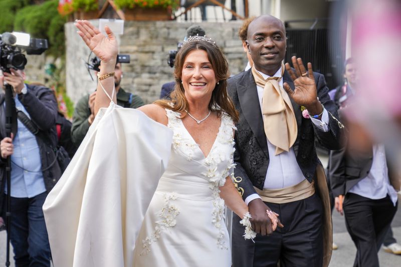 Norway's Princess Martha Louise and Durek Verrett arrive for their wedding party, in Geiranger, Norway, Saturday Aug. 31, 2024. (Heiko Junge/NTB via AP)