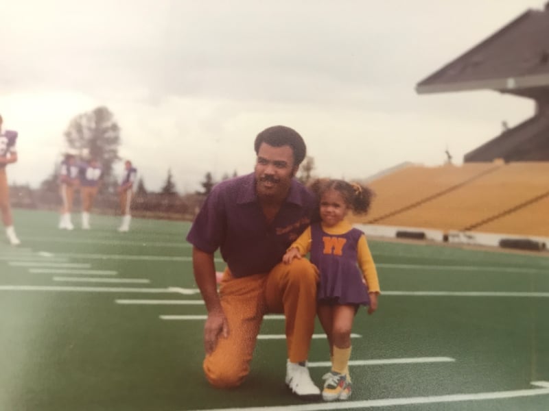 A young Tarana Harris Mayes and her father Chick Harris in 1979. Chick Harris coached at the University of Washington for five years before beginning a 33-year career as an NFL assistant coach.