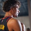 Hawks player Dominick Barlow, #0, takes interview questions during media day. Hawks media day takes place on Monday, Sept 30, 2024 where media outlets including the Associated Press, Getty, NBA and many others gather to take photos, conduct interviews and gather footage.   (Jenni Girtman for The Atlanta Journal-Constitution)