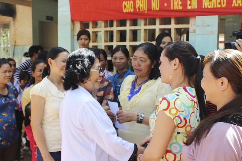 This undated photo provided by the Ramon Magsaysay Award Foundation shows 2024 Ramon Magsaysay Awardee, Nguyen Thi Ngoc Phuong, center, from Vietnam. (Ramon Magsaysay Awards Foundation via AP)