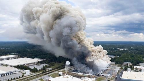 Smoke billows from a fire at the BioLab facility in Conyers on Sunday, Sept. 29, 2024.ÊÊÊBen Gray for the Atlanta Journal-Constitution