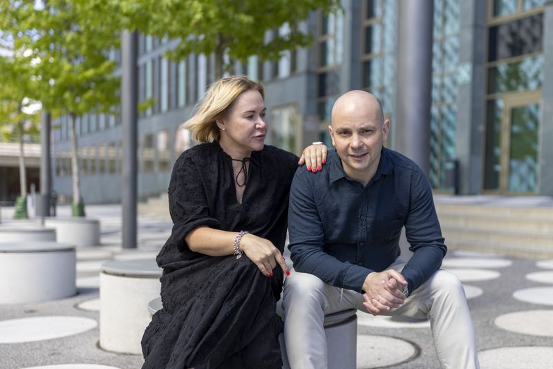 Andrei Pivovarov, a Russian dissident freed in the historic East-West prisoner swap, right, and his wife, Tatyana Usmanova, pose for a photo before an interview with The Associated Press in Berlin, Germany, on Sunday, Aug. 12, 2024. (AP Photo/Axel Schmidt)