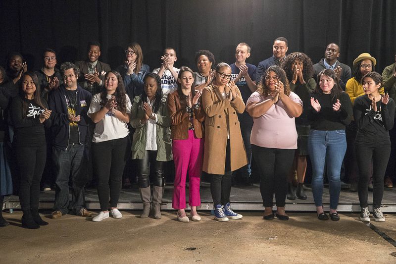 Abrams staffers applaud after she ended her campaign. (ALYSSA POINTER/ALYSSA.POINTER@AJC.COM)