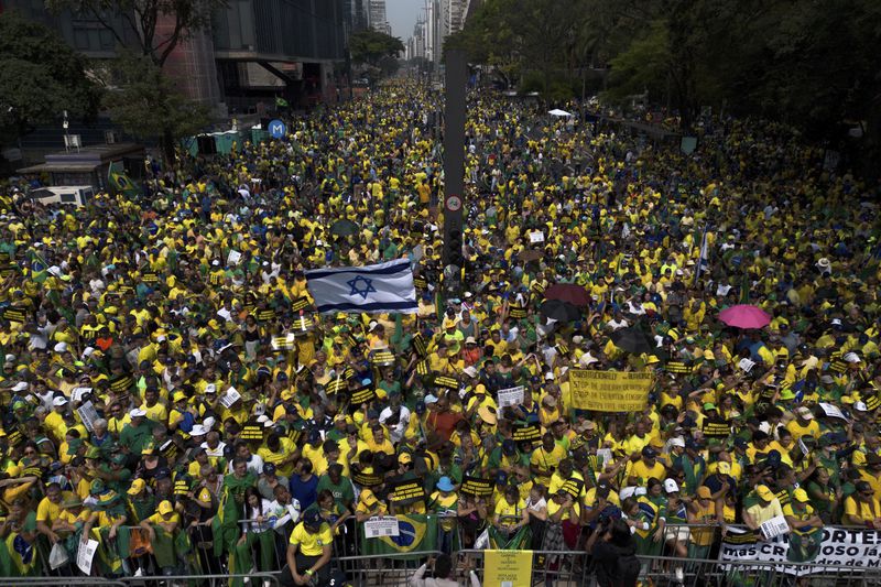 Demonstrators take part in a protest calling for the impeachment of Supreme Court Minister Alexandre de Moraes, who recently imposed a nationwide block on Elon Musk’s social media platform X, in Sao Paulo, Saturday, Sept. 7, 2024. (AP Photo/Ettore Chiereguini)