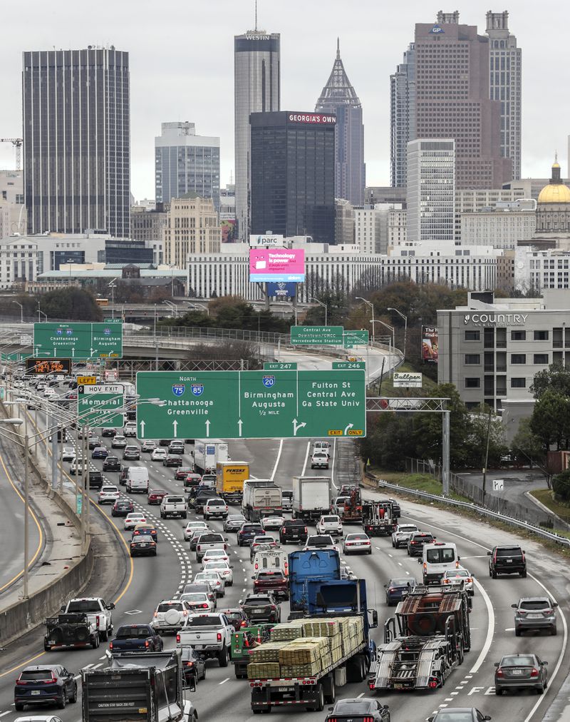 December 12, 2022 Atlanta: Northbound Connector traffic heads into downtown Atlanta on Monday, Dec. 12, 2022 as record numbers of Georgians are expected to hit the roads over the next few weeks, according to a AAA forecast. (John Spink / John.Spink@ajc.com)

