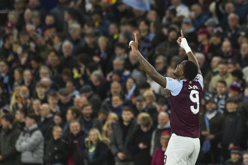 Aston Villa's Jhon Duran celebrates after scoring the opening goal during the Champions League opening phase soccer match between Aston Villa and Bayern Munich, at Villa Park in Birmingham, England, Wednesday, Oct. 2, 2024. (AP Photo/Rui Vieira)