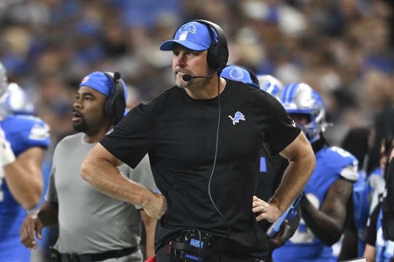 Detroit Lions head coach Dan Campbell watches against the Los Angeles Rams during the first half of an NFL football game in Detroit, Sunday, Sept. 8, 2024. (AP Photo/David Dermer)