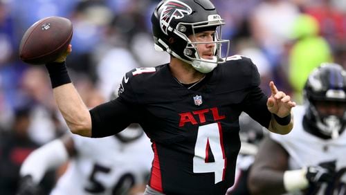 Atlanta Falcons quarterback Taylor Heinicke passes against the Baltimore Ravens during the first half of a preseason NFL football game on Saturday, Aug. 17, 2024, in Baltimore. (AP Photo/Nick Wass)