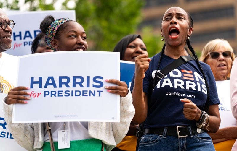 Moriah McNair of Atlanta (left) and Jane Williams of South Fulton (right) cheer in support of Vice President Kamala Harris at a event in Atlanta on Wednesday.