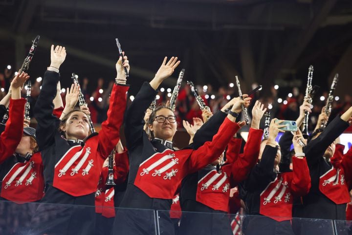 The Georgia Bulldogs Redcoat Marching Band reacts after a scored against the TCU Horned Frogs during the second half of the College Football Playoff National Championship at SoFi Stadium in Los Angeles on Monday, January 9, 2023. Georgia won 65-7 and secured a back-to-back championship. (Jason Getz / Jason.Getz@ajc.com)