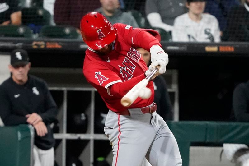 Los Angeles Angels' Taylor Ward (3) hits a two-run single against the Chicago White Sox during the fourth inning of a baseball game, Wednesday, Sept. 25, 2024, in Chicago. (AP Photo/David Banks)