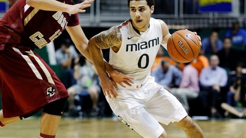 Shane Larkin, son of Reds Hall of Fame shortstop Barry Larkin, driving to the basket for the No. 3 ranked Miami Hurricanes.