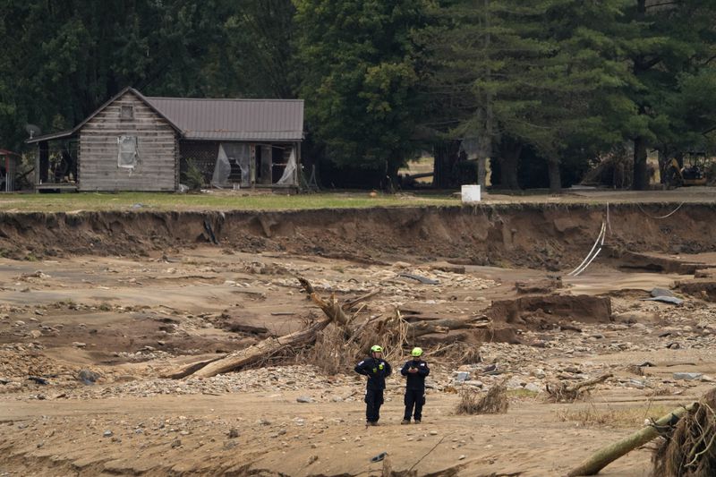 Personnel from Urban Search and Rescue Utah Task Force 1 continue to search for victims of the Impact Plastics tragedy in the aftermath of Hurricane Helene Friday, Oct. 4, 2024, in Erwin, Tenn. (AP Photo/Jeff Roberson)