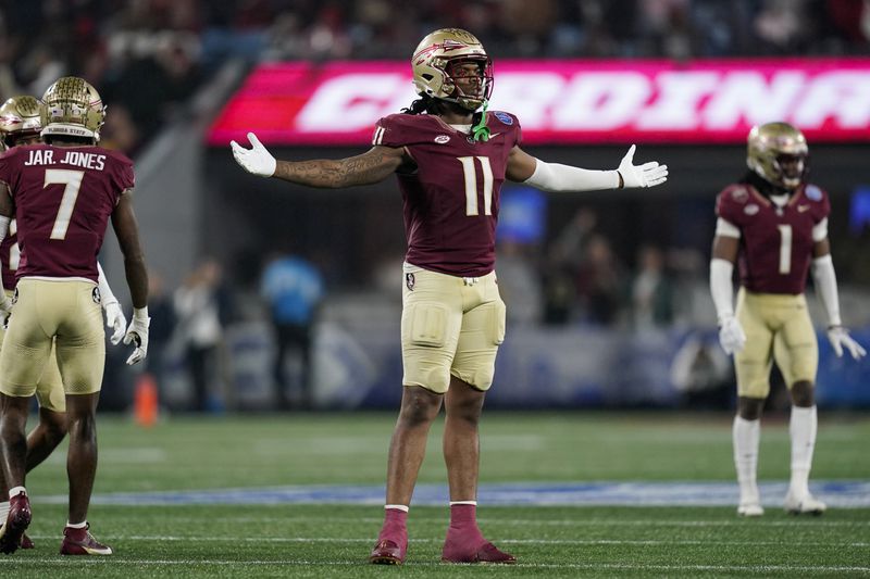 FILE - Florida State defensive lineman Patrick Payton reacts after a play during the second half of the team's Atlantic Coast Conference championship NCAA college football game against Louisville, Saturday, Dec. 2, 2023, in Charlotte, N.C. (AP Photo/Erik Verduzco, File)