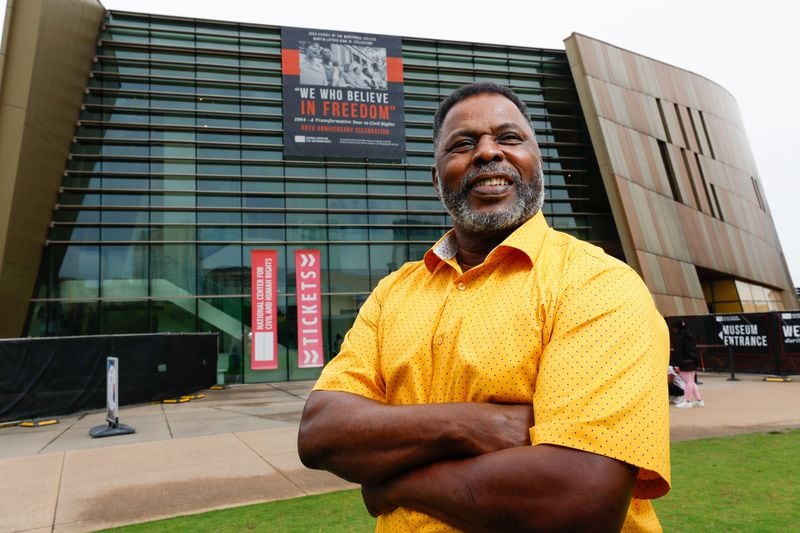 Harold Scott, shown outside the National Center for Civil and Human Rights in downtown Atlanta, says that sports helped knit the Black and white children together when his elementary school integrated in Emanuel County. He says that after a year of adjustment, by sixth grade, things had become "comfortable." (Miguel Martinez / AJC)