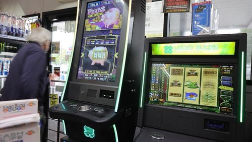 Coin-operated amusement machines await customers inside a Chevron station in Midtown Atlanta. There are 34,000 such machines in over 6,200 stores in the state, accounting for the fastest-growing source of revenue for the Georgia Lottery. (Natrice Miller/natrice.miller@ajc.com)