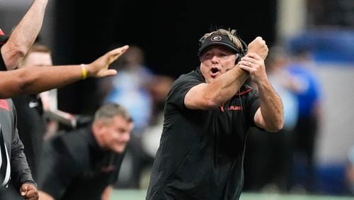 Georgia head coach Kirby Smart reacts during the first half of an NCAA college football game against Clemson Aug. 31, 2024, in Atlanta. (AP Photo/John Bazemore)