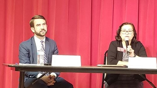 Republican Houston Gaines and Democrat Deborah Gonzalez participate in a candidate forum in Winder. Maya T. Prabhu/maya.prabhu@ajc.com