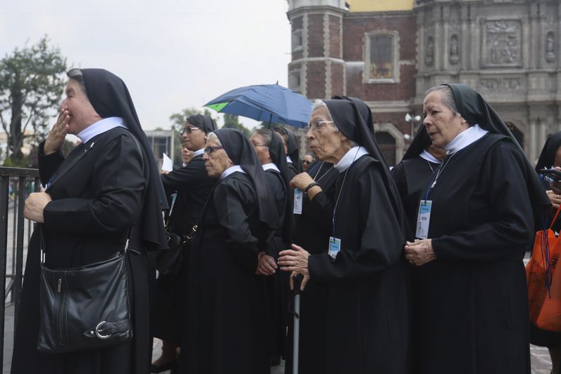 Nuns arrive for the beatification ceremony of Rev. Moisés Lira at the Basilica of Our Lady of Guadalupe in Mexico City, Saturday, Sept. 14, 2024. (AP Photo/Ginnette Riquelme)