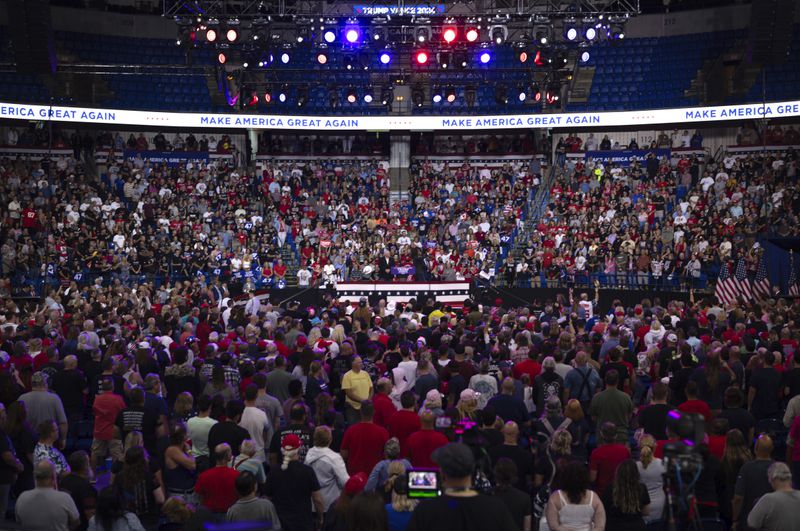 The crowd waits for Republican presidential nominee former President Donald Trump to speak at a campaign rally at the Mohegan Sun Arena at Casey Plaza in Wilkes-Barre, Pa., Saturday, Aug. 17, 2024. (AP Photo/Laurence Kesterson)