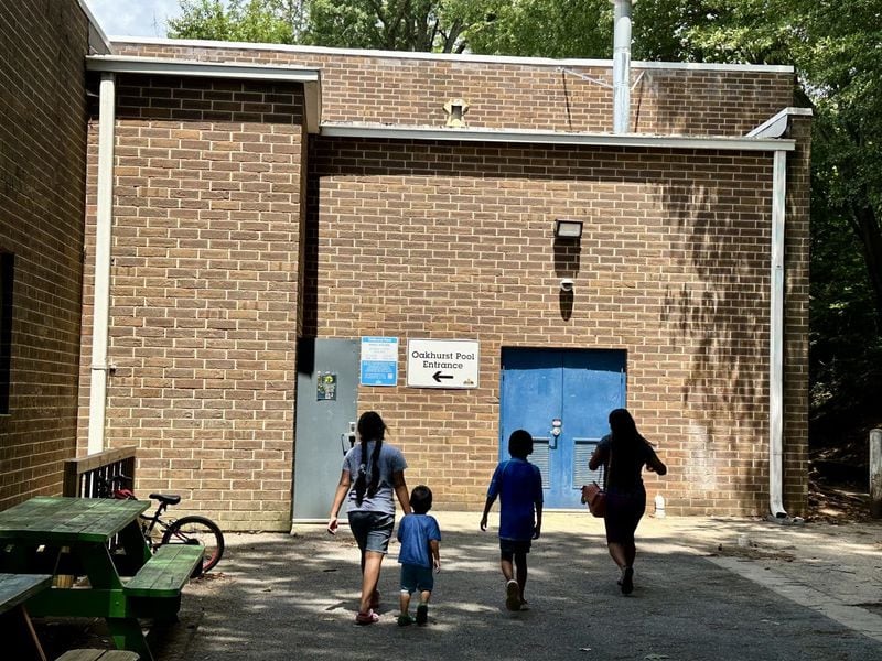 Marcela Cruz-Baltazar and her three children visit the Oakhurst Pool in Decatur. (Photo Courtesy of Daniela Cintron)