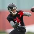 Atlanta Falcons wide receiver Drake London (5) makes a catch during minicamp at the Atlanta Falcons Training Camp, Tuesday, May 14, 2024, in Flowery Branch, Ga. (Jason Getz / AJC)
